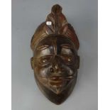 AFRIKANISCHE KUNST / MASKE / tribal Art, Holz, geschnitzt. Aufgewölbte Maske mit angedeutetem
