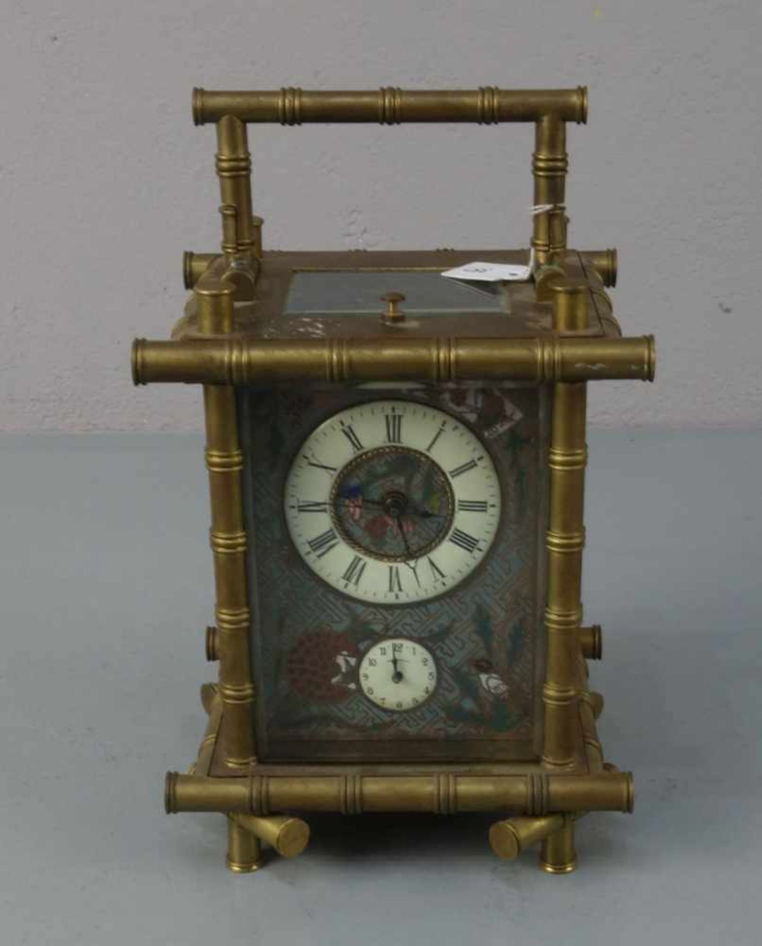 JOPONISTISCHE UHR / TISCHUHR / REISEUHR MIT WECKFUNKTION, schweres Bronze - Gelbguss - Gehäuse in