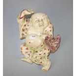 FIGÜRLICHE WANDVASE "Tanzender Buddha", Keramik, heller Scherben, elfenbeinfarben glasiert und