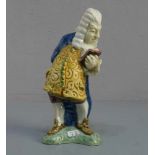 PORZELLANFIGUR / porcelain figure: "Der Advokat", unter dem Stand mit ungedeuteter heraldischer