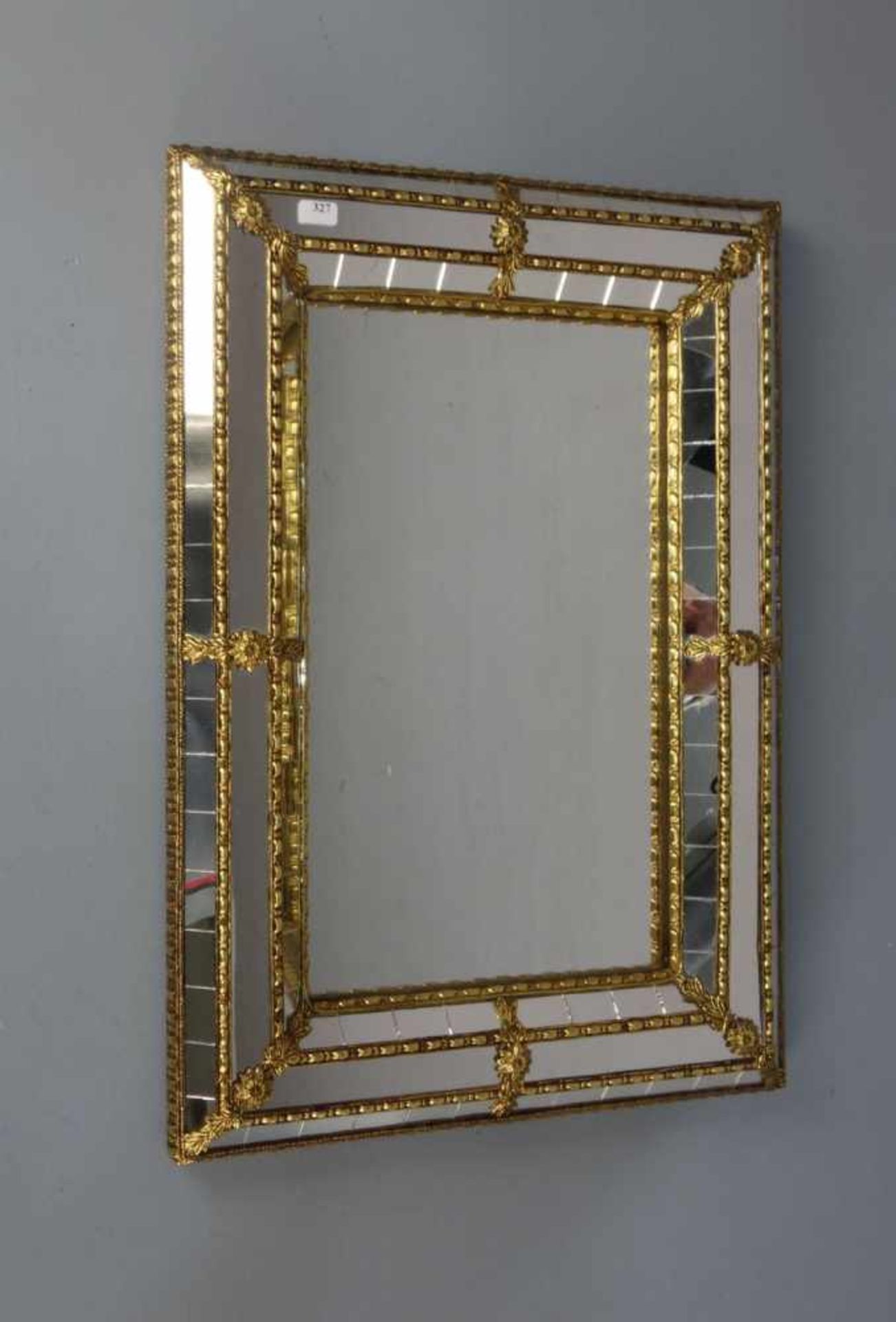 SPIEGEL / mirror, mit verspiegelter Rahmung und messingfarbenen Metallmonturen. H. 44,5 x B. 32 x T.