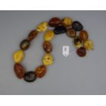 BERNSTEINKETTE / - STRANG / amber necklace, mit 19 Steinen unterschiedliche Farbigkeit, Form und