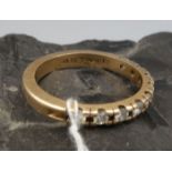 HALB - MEMORY - RING, 585er Gelbgold (3,9 g), besetzt mit 9 Brillanten. In der Ringschiene