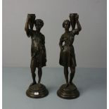 BILDHAUER DES 20. Jh., Skulpturenpaar / pair of sculptures: "Figürliches Leuchterpaar / Paar '