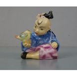 FIGUR "Kind mit Vogel" / porcelain figure - child with a bird, 20. Jh., Porzellan, polychrom