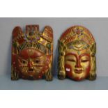 PAAR MASKEN "Mann und Frau", Asien, 20. Jh., Holz, geschnitzt, polychrom und goldfarben gefasst