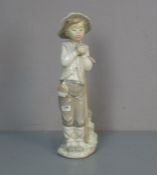 FIGUR: "Knabe mit Vogel" / porcelain figure: "boy with a bird", Porzellan, Manufaktur Nao,