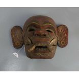 BALINESISCHE MASKE / mask, Bali, Holz, geschnitzt und farbig gefasst, um 1920. Aufgewölbte Maske