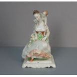 FIGURENGRUPPE "Frau mit Blumenstrauß und Amorette" / porcelain figure: "Woman with flowers and