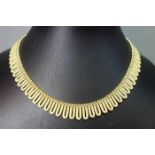 UNO A ERRE - COLLIER, Italien, 750er Gelbgold (50,2 g); anschmiegsame, elegante Form mit