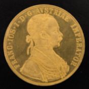 Franz Josef Dukat Vierfach.Durchmesser: 39,5 mm.Legierung: Gold 986.Gewicht: 13,769 g.