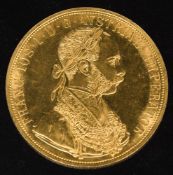 Franz Josef Dukat Vierfach.Durchmesser: 39,5 mm.Legierung: Gold 986.Gewicht: 13,769 g.
