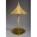 Marbled brass Arts and Craft table lamp with pagoda shade on fourfold column and curved base,