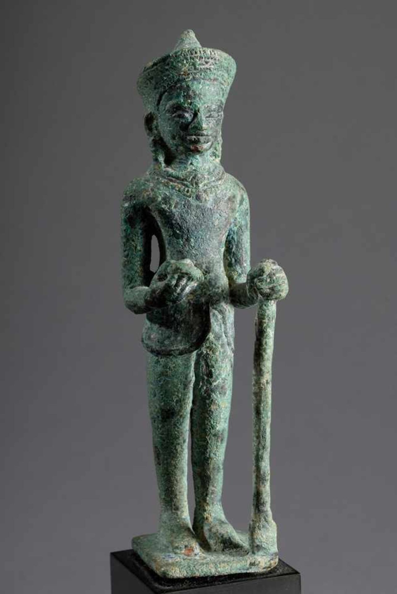 Standing Khmer bronze figure "Godness" holding a chakra in her right hand, probably Shiva, Bayon