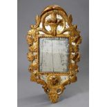 Small cartridge mirror with gilded carving, 91x51cm, slightly defective