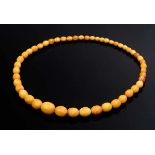 Amber necklace in the course, olive shaped beads, 37,6g, Ø 7,5-15/9,6-19,8mm, L. 63cm, evidence of