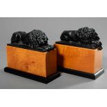 Pair of Galvano bookends "Lying lions" on wooden pedestals, 20th century, 18x9x20cm