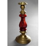 Rural brass candlestick with red glass baluster, h. 23cm, pressure marks