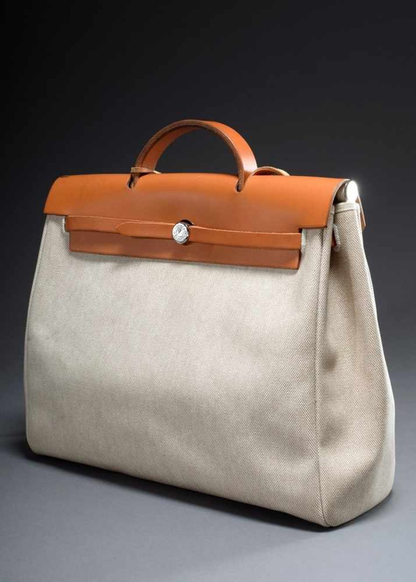 Hermès "Herbag" with natural leather and exchangeable canvas bags, 38x30/43x37cm, traces of