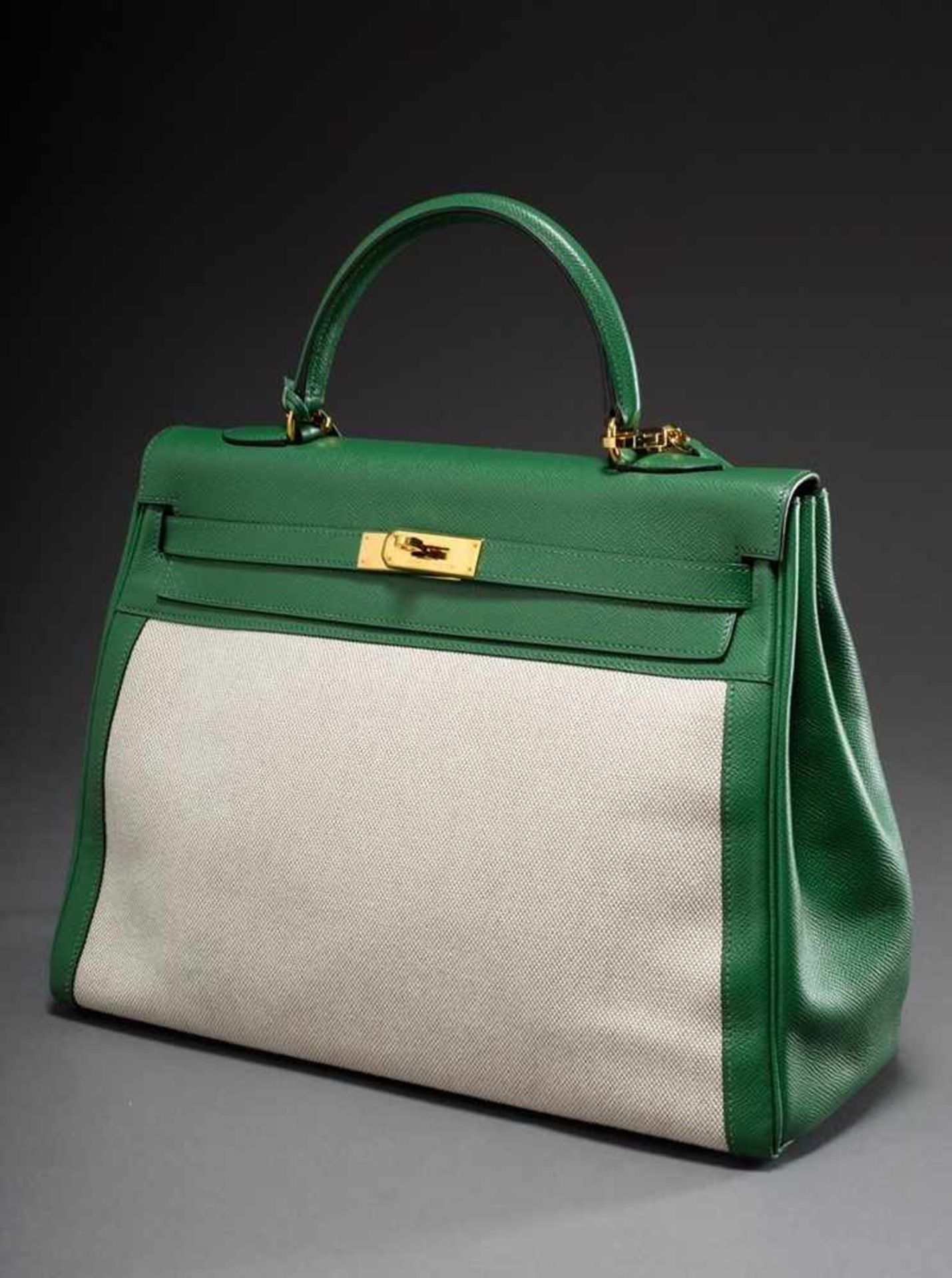 Hermès "Kelly Bag 35" 1999, linen and green calfskin, trapezoid body with arched carrying handle,