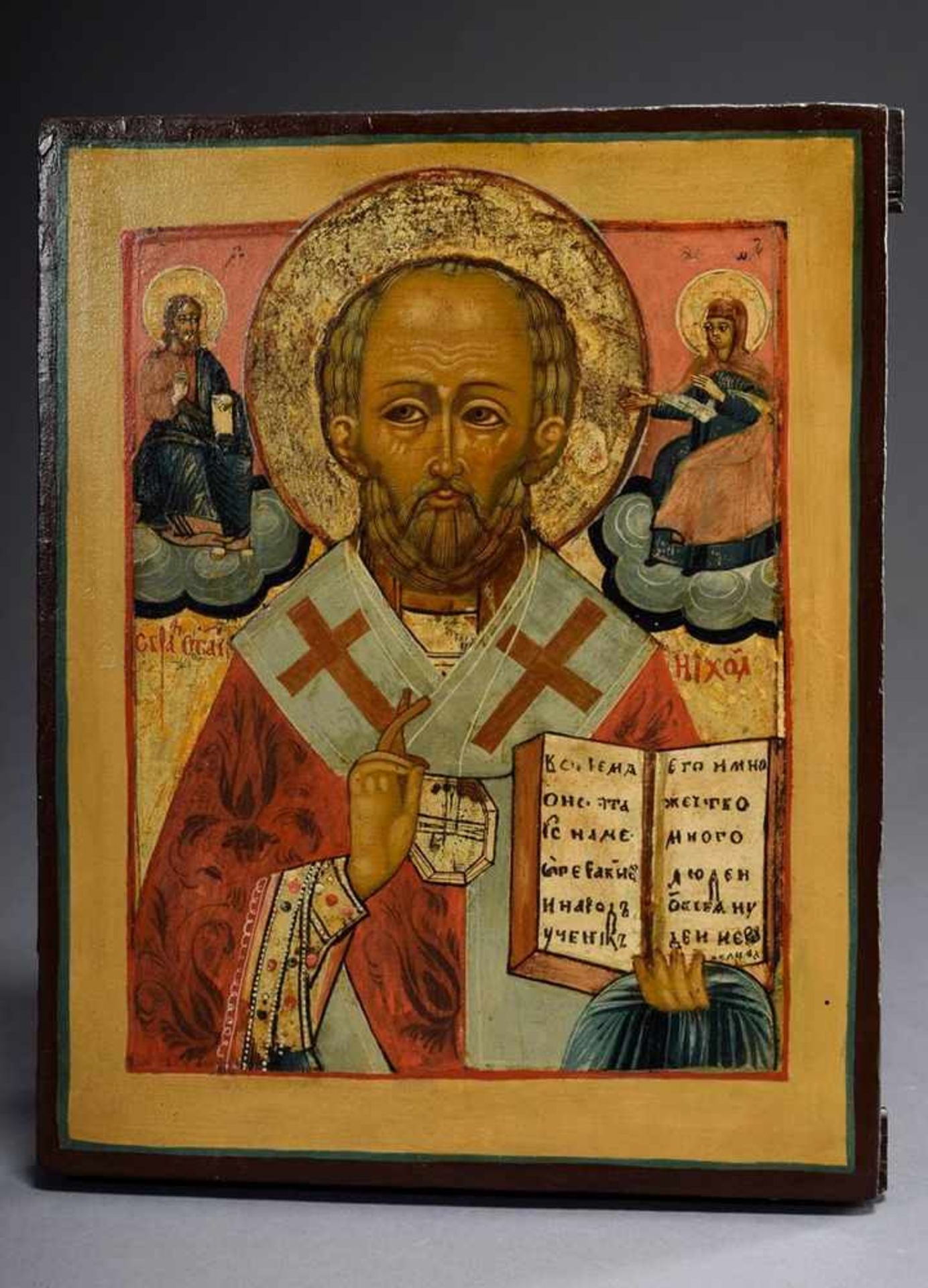 Russian icon "Saint Nicholas flanked by Christ and Mary" in light-coloured frame, egg tempera/
