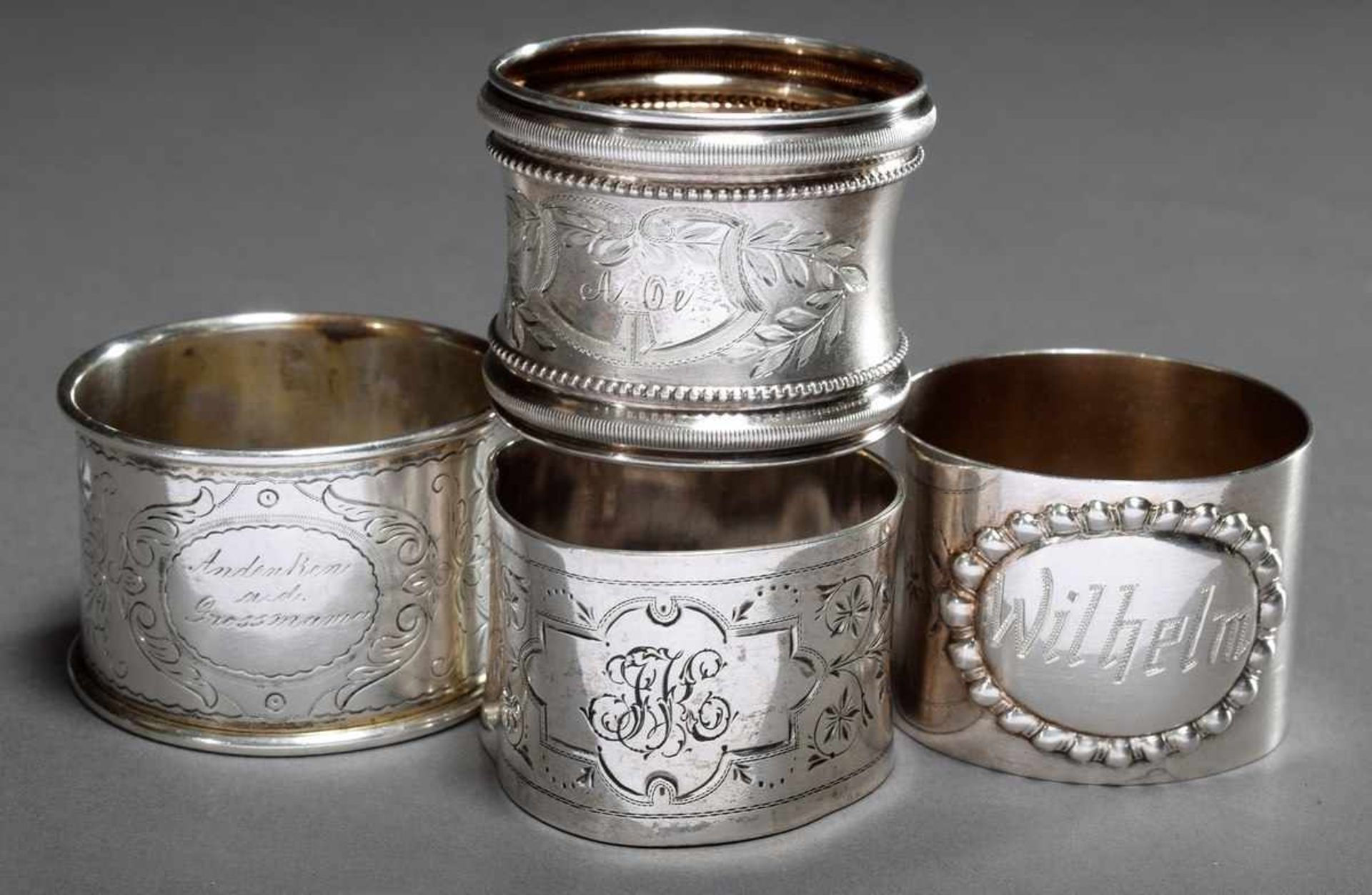 4 Various napkin rings with floral engravings and names, silver 800, 108g, some pressure marks4