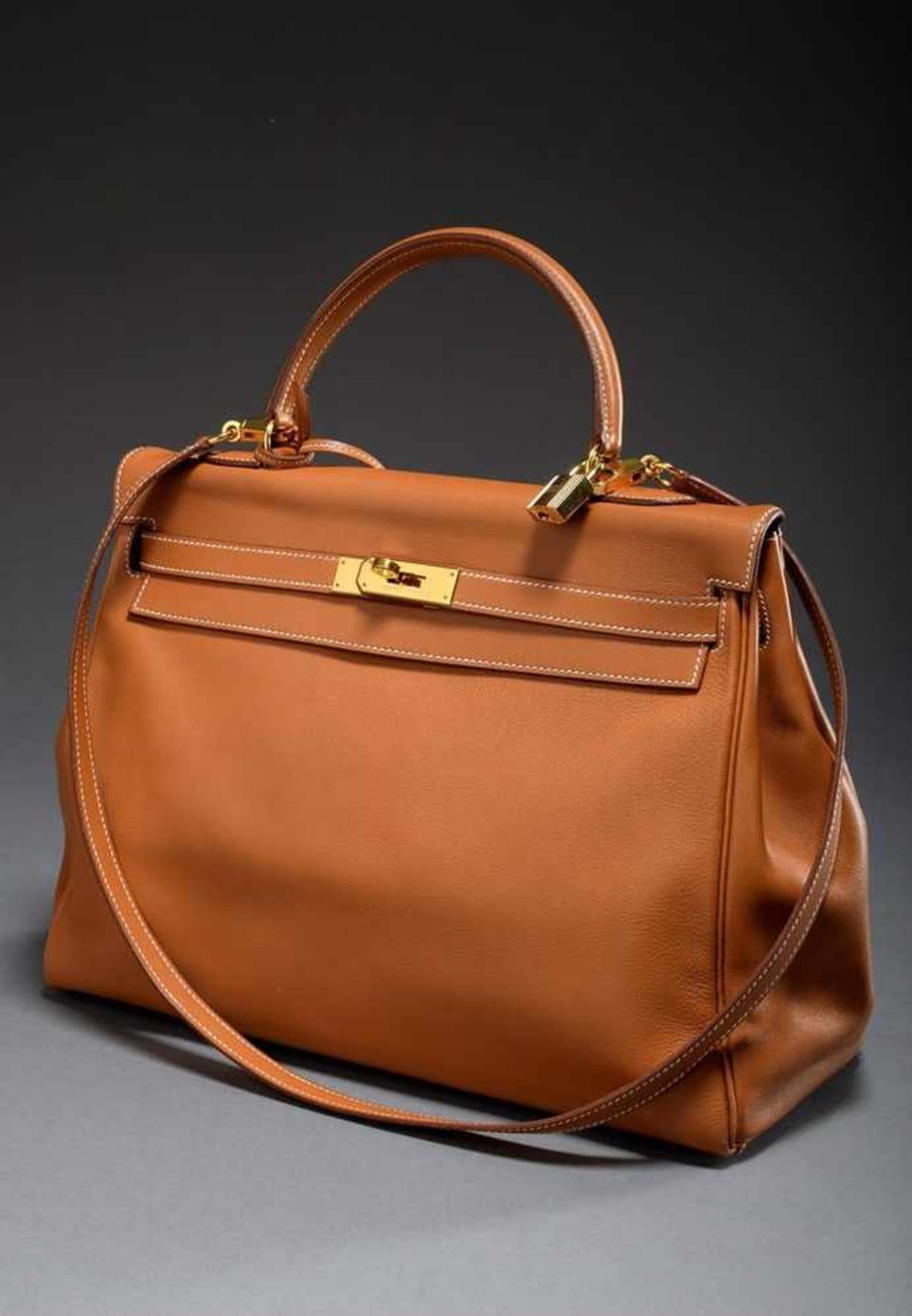 Hermès "Kelly Bag Souple 35", 1995, cognac calfskin, trapezoid body with arched carrying handle,
