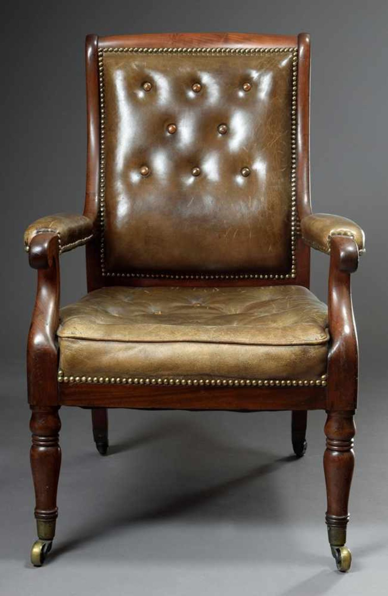English mahogany desk chair with armrests and green leather upholstery, 2nd half 19th century, h.