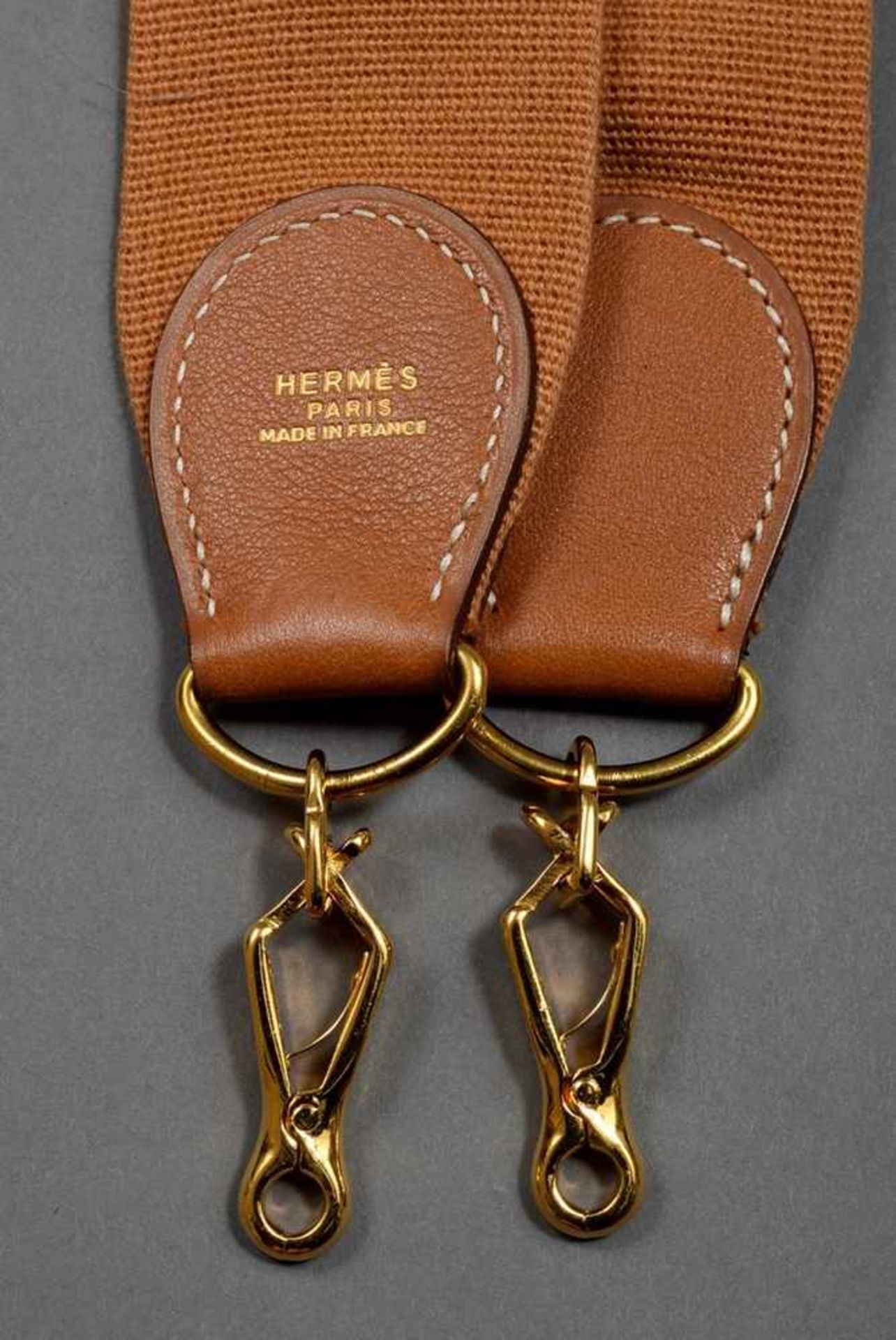 Hermès Sangle, cognac, cotton/leather/gold plated metal, l. 99cm, wornHermès Sangle, cognac,