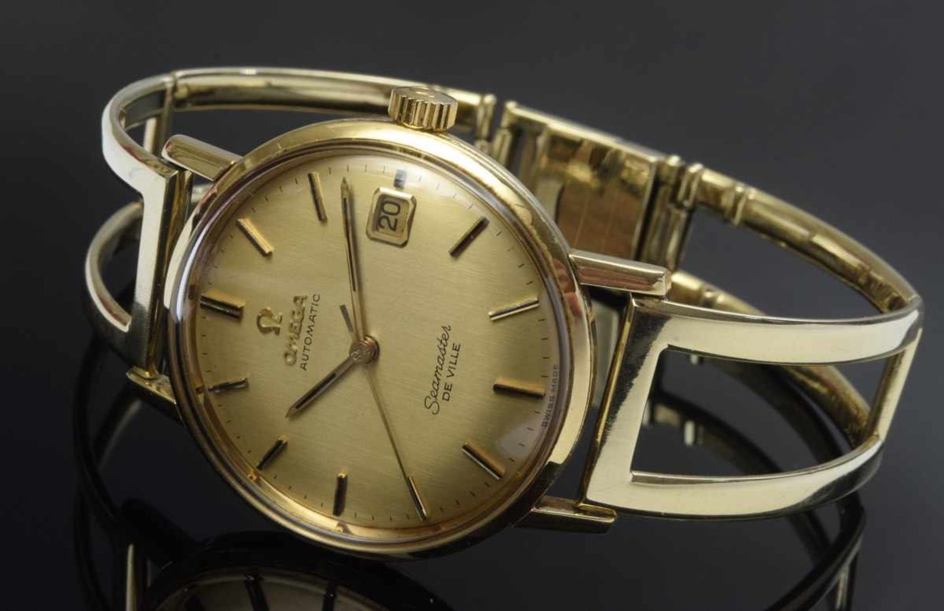 GG 750 Omega "Seamaster De Ville" watch with openworked GG 585 strap, automatic movement, date,
