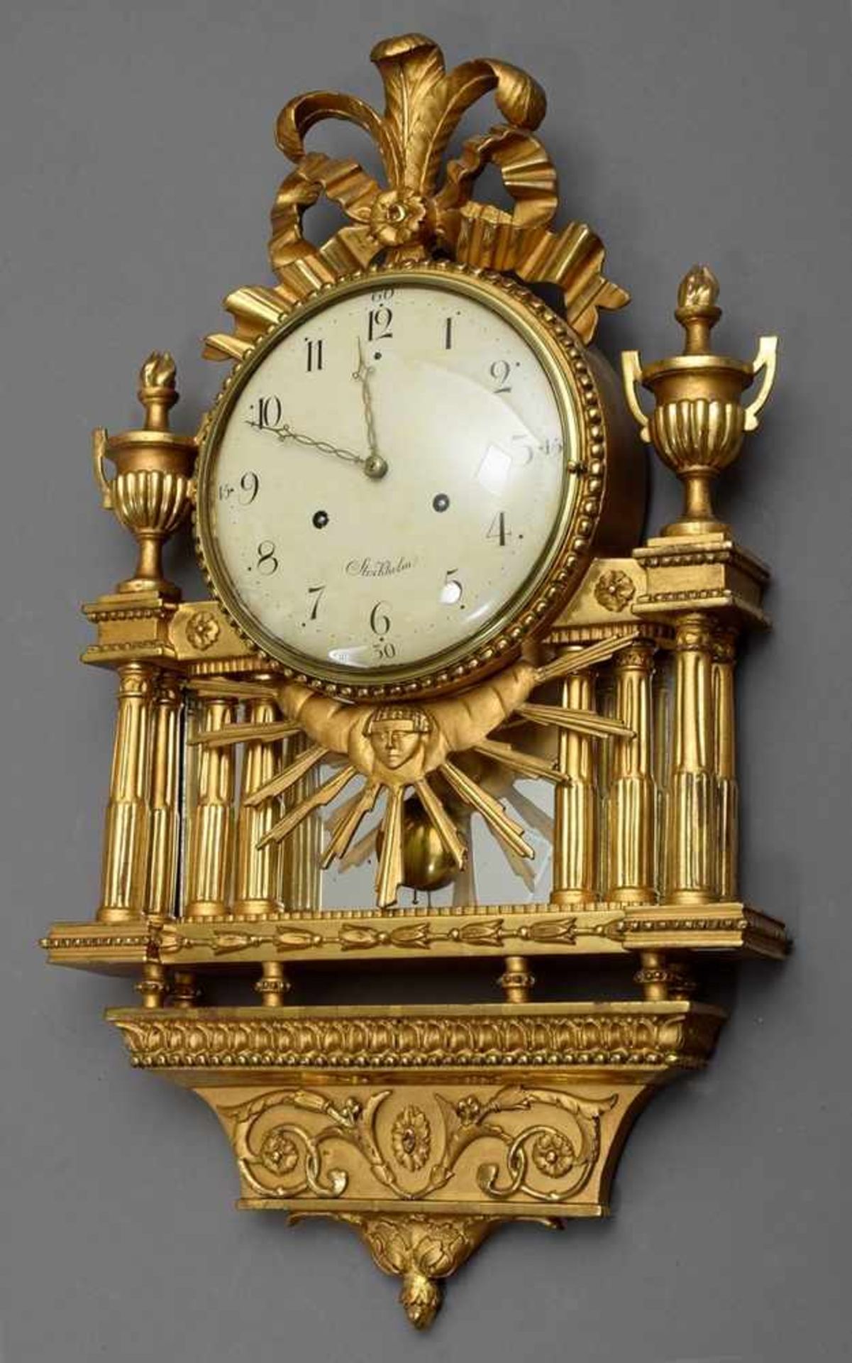 Swedish wall clock in gilded wood framing "Antique temple with sun symbol" and plastic loop