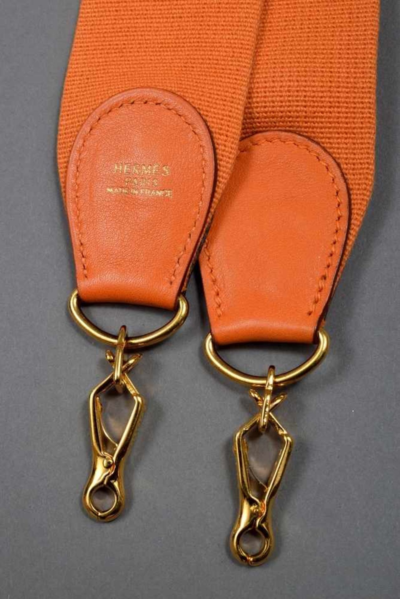 Hermès Sangle, orange, cotton/leather/gold plated metal, l. 106cm, wornHermès Sangle, orange,