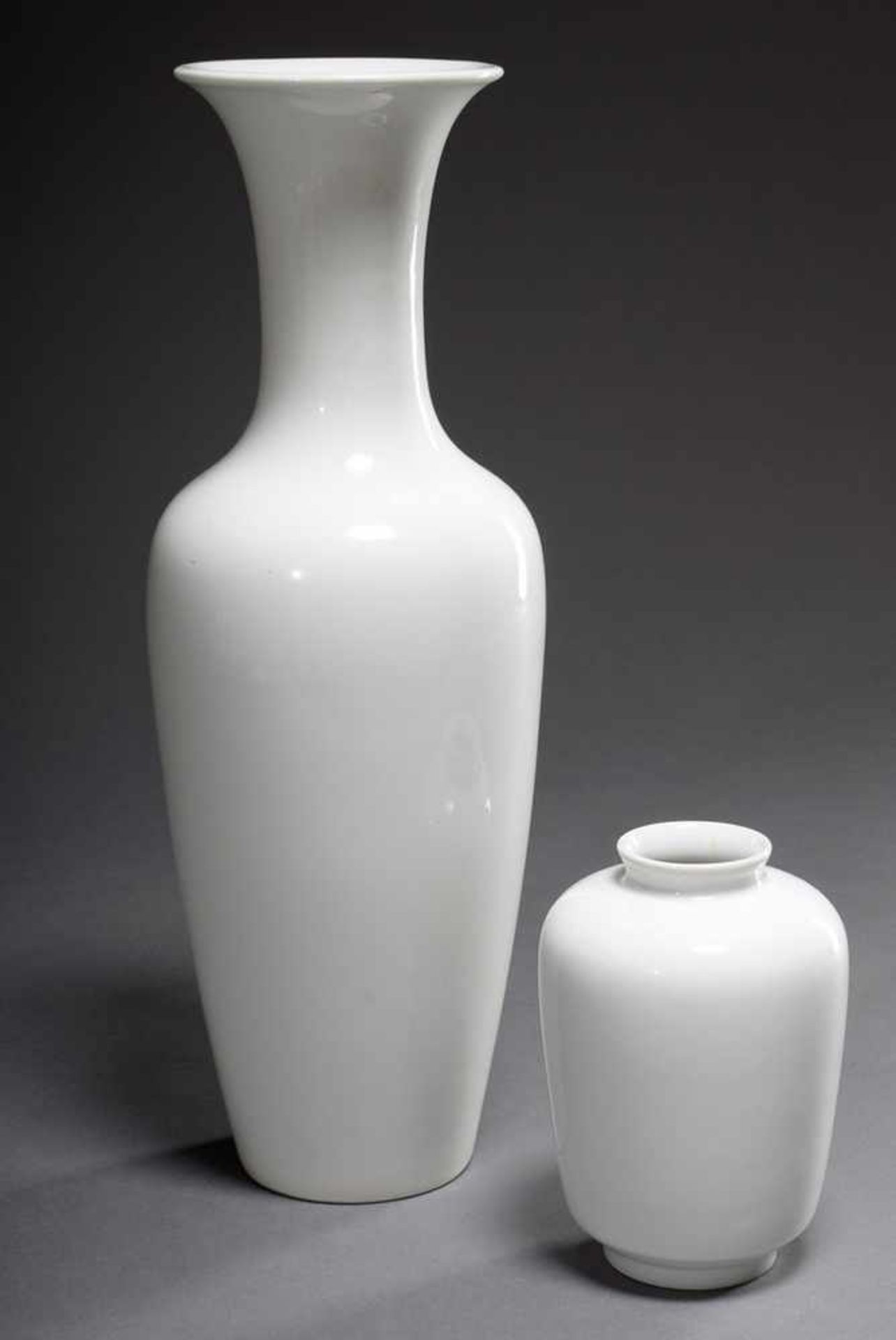 2 Various white KPM vases, 20th century, h. 13/34cm2 Diverse weiße KPM Vasen, 20.Jh., H. 13/34cm