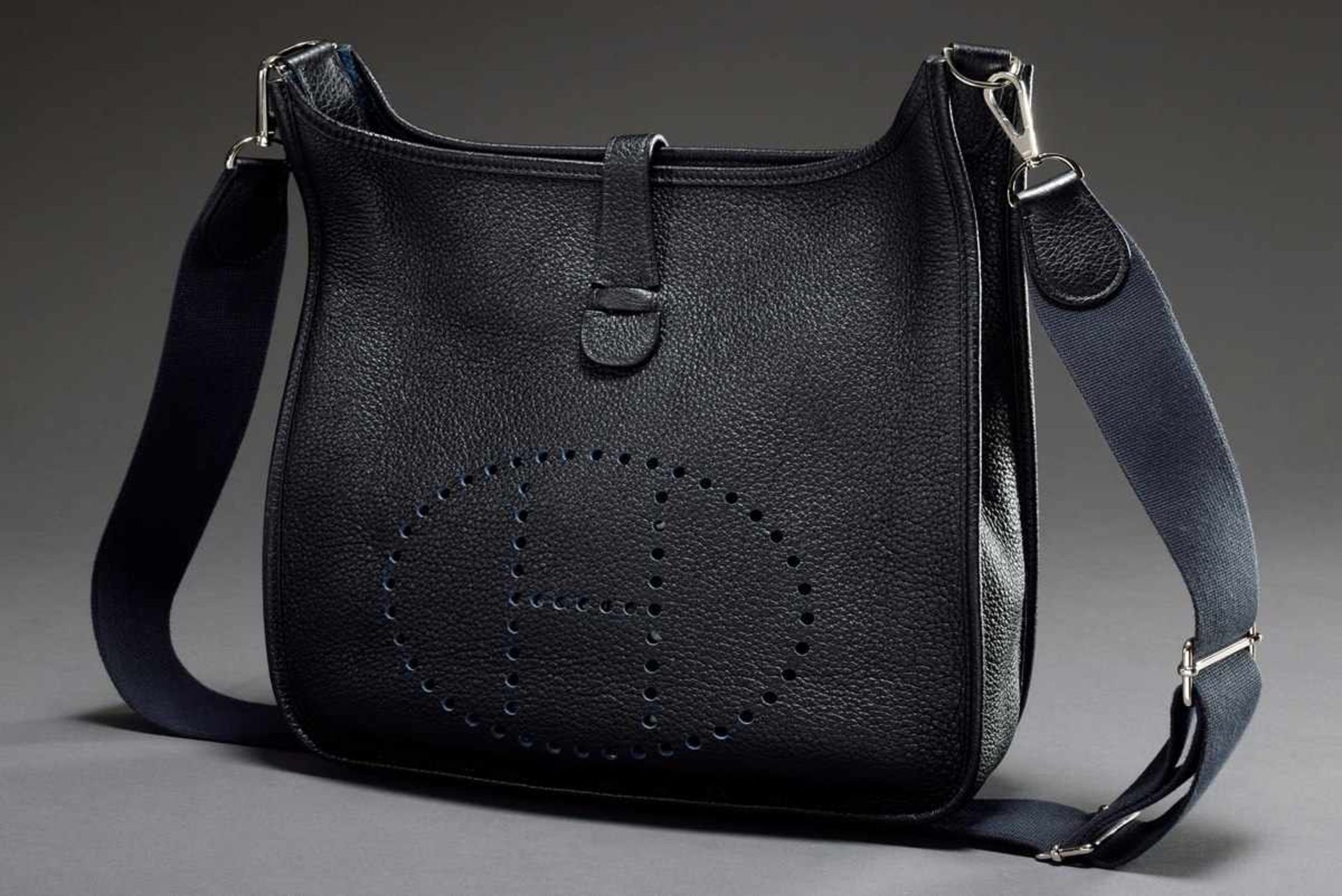 Hermès "Evelyn", 2009, dark blue calfskin, open shoulder bag with perforated "H" logo and Canvas