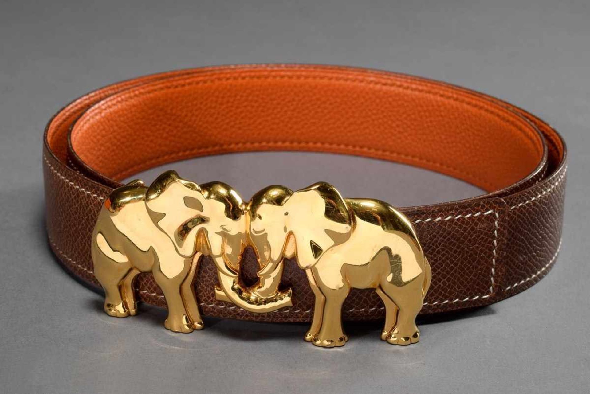 Hermès belt with gold plated "elephant" buckle, cognac, 2001, l. 85cm, b. 3cm, original bag and box,