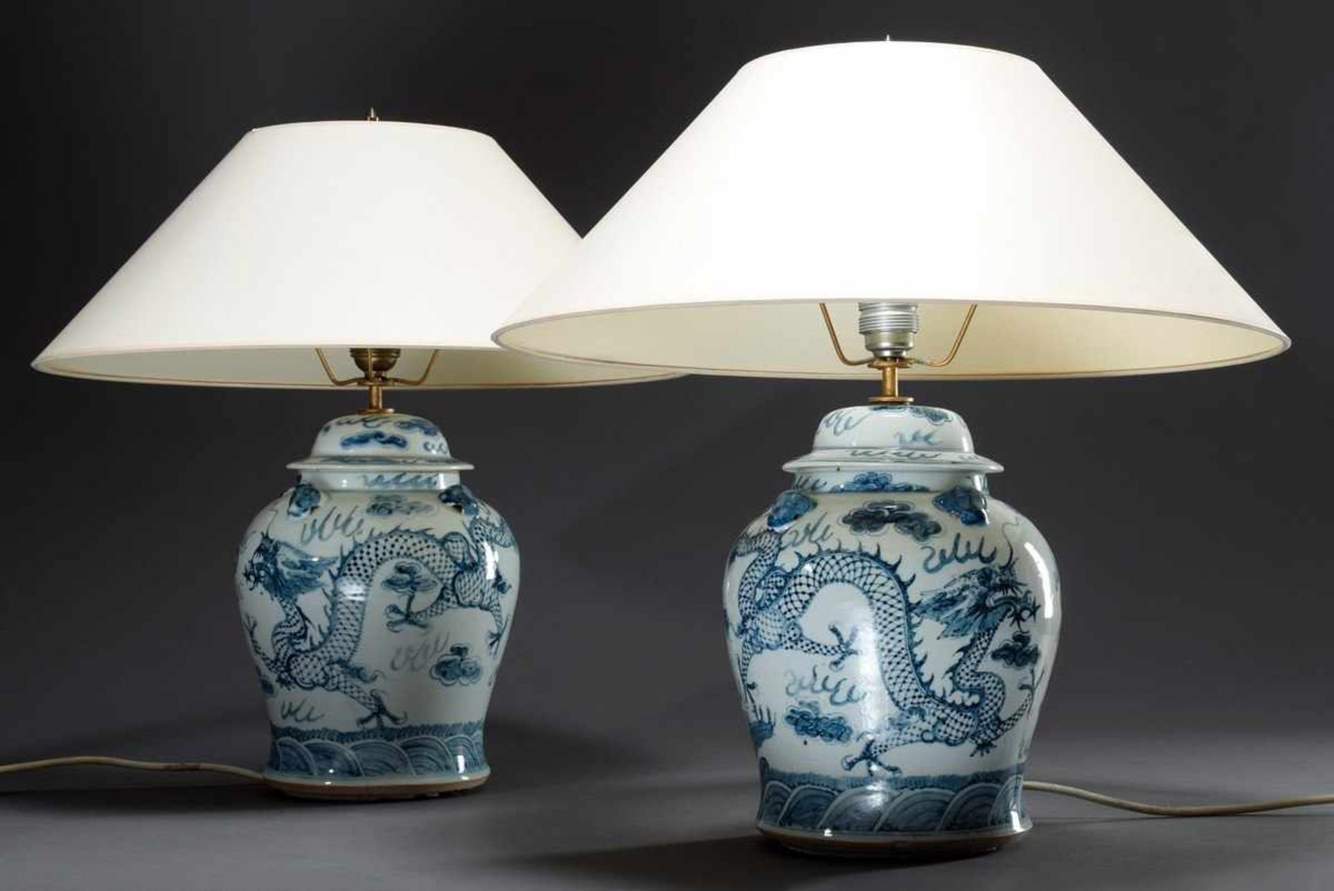 Pair of Chinese porcelain lamps with blue painting decoration "Cloud dragon with ball", h. 52cm,
