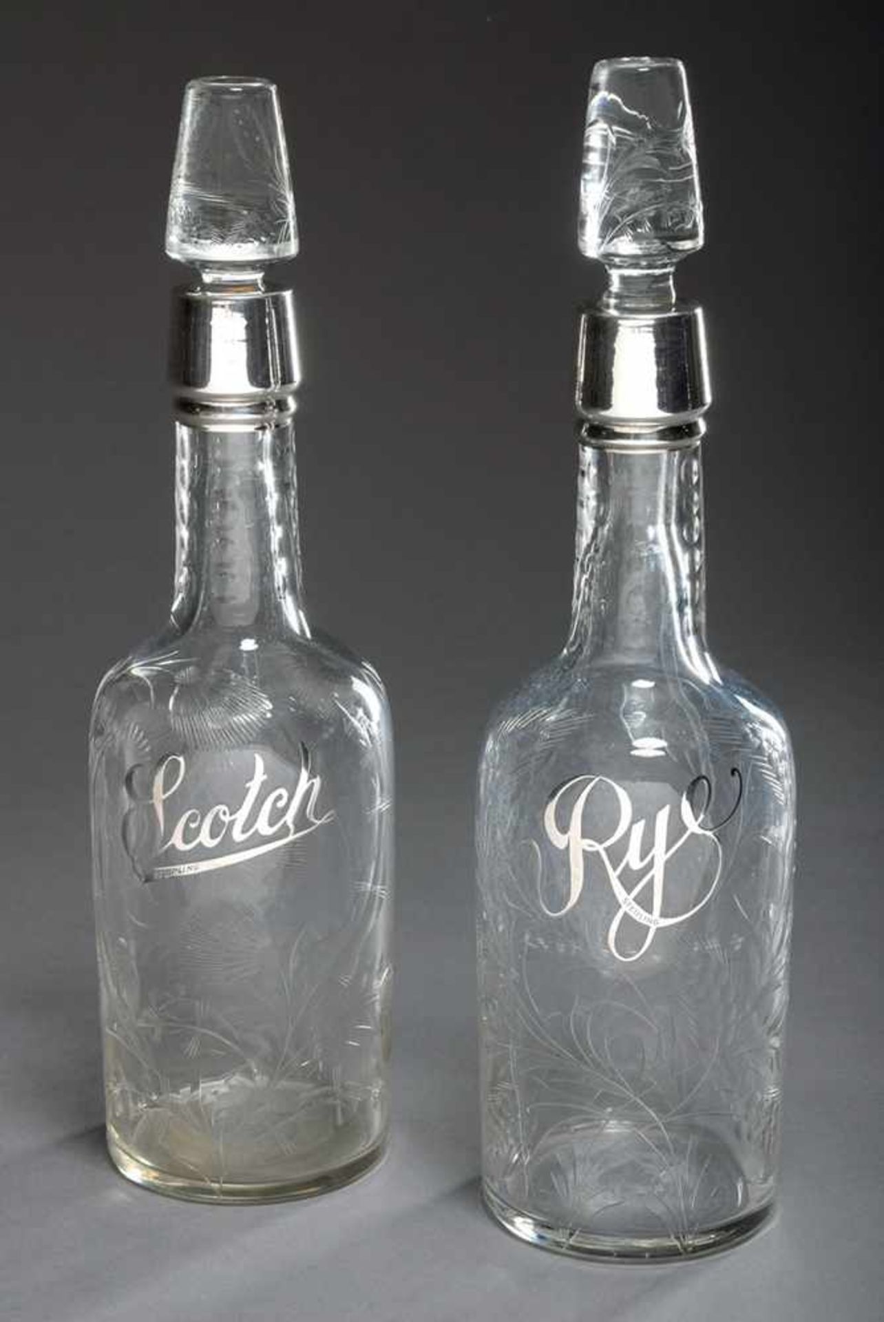 Pair of carafes with floral cut and silver overlay "Rye" and "Scotch", around 1910/1920, h. 33cm,