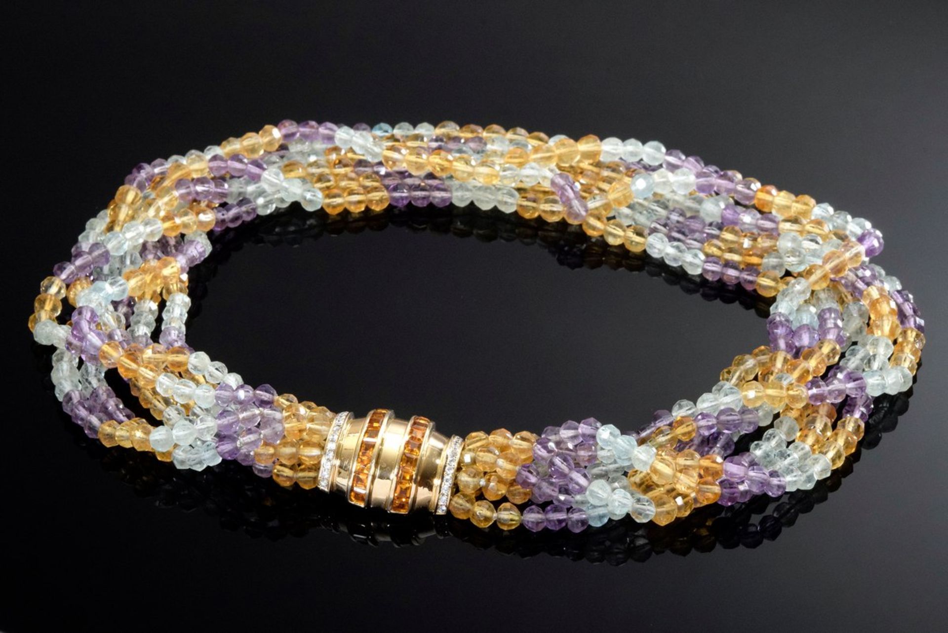 Dekoratives 7reihiges Collier aus facettierten Amethyst-, Aquamarin- und Goldtopasperlen mit