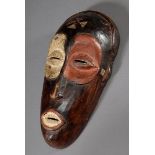 Kleine afrikanische Maske mit rot/weißen Augen, Holz geschnitzt, wohl Nigeria, 25x12cm, kleine