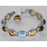 Armband mit 7 Citrin- und 3 Topas-Cabochons, Goldschmiedearbeit von Sabine Halstrick, Bonn, 21.