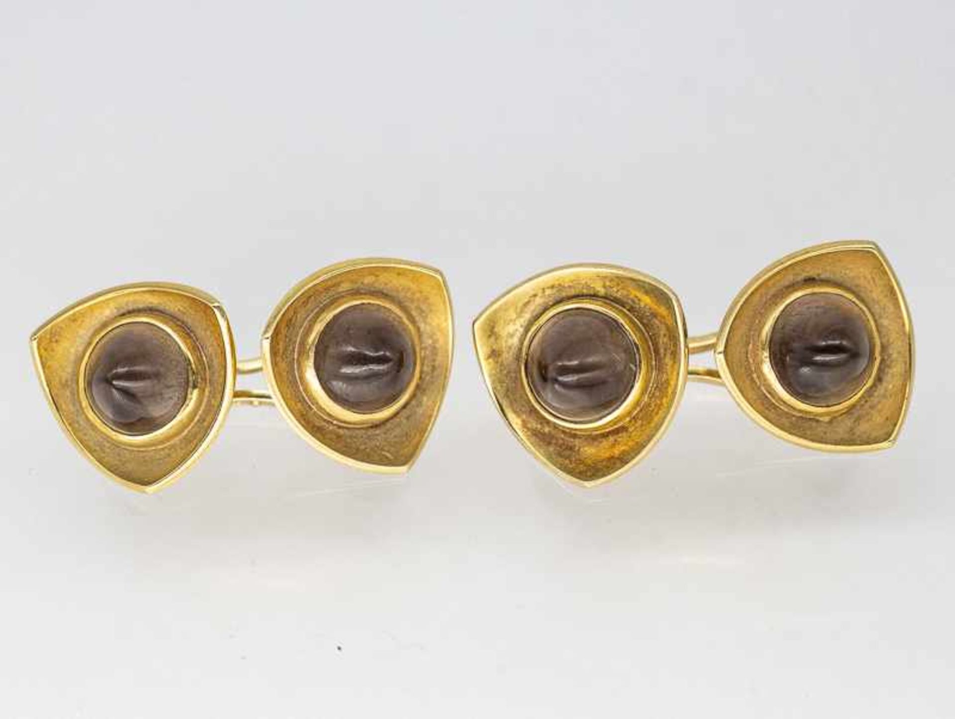 Paar Manschettenknöpfe mit Rauchquarz-Cabochons, aus der Goldschmiedewerkstatt Ulla Popp (1928-