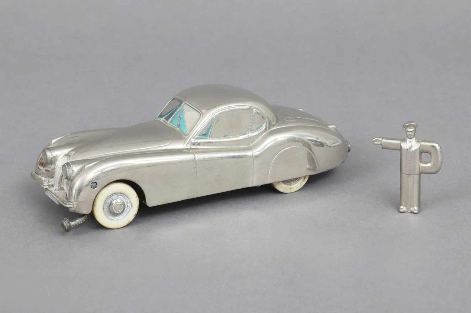 PRÄMATA (Köln) Jaguar XK 120 Modellauto mit Federaufzug, um 1954/55, polierter Metall-Spritzguß,