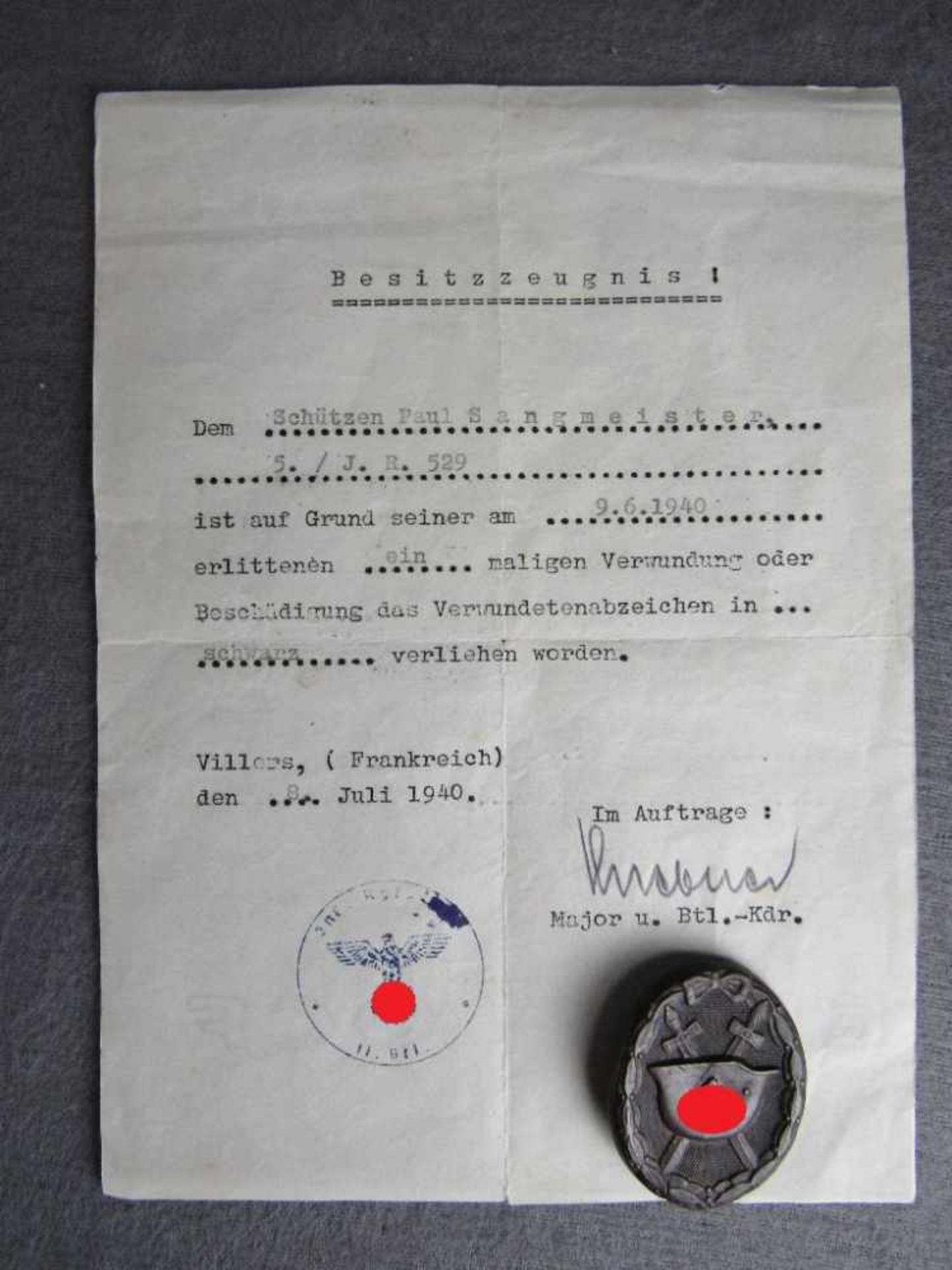 Besitzzeugnis Verwundetenzeugnis in schwarz original 2.WK + Orden