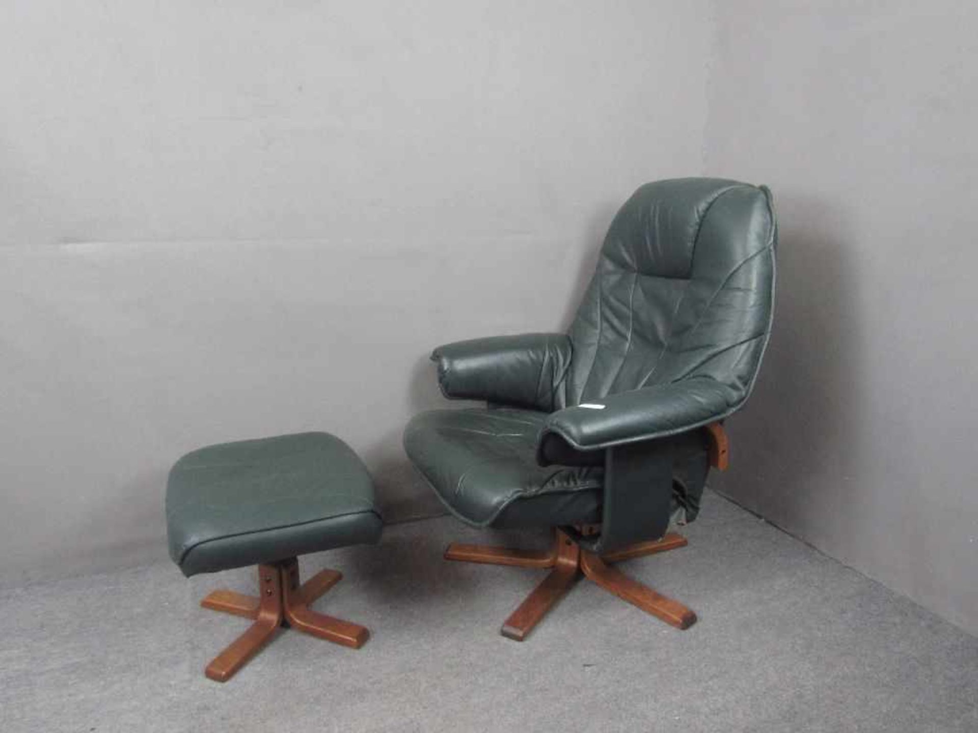 Vintage 70er Jahre Danish Design Lounge Sessel mit Ottomane gemarkt Unico dark green Leder