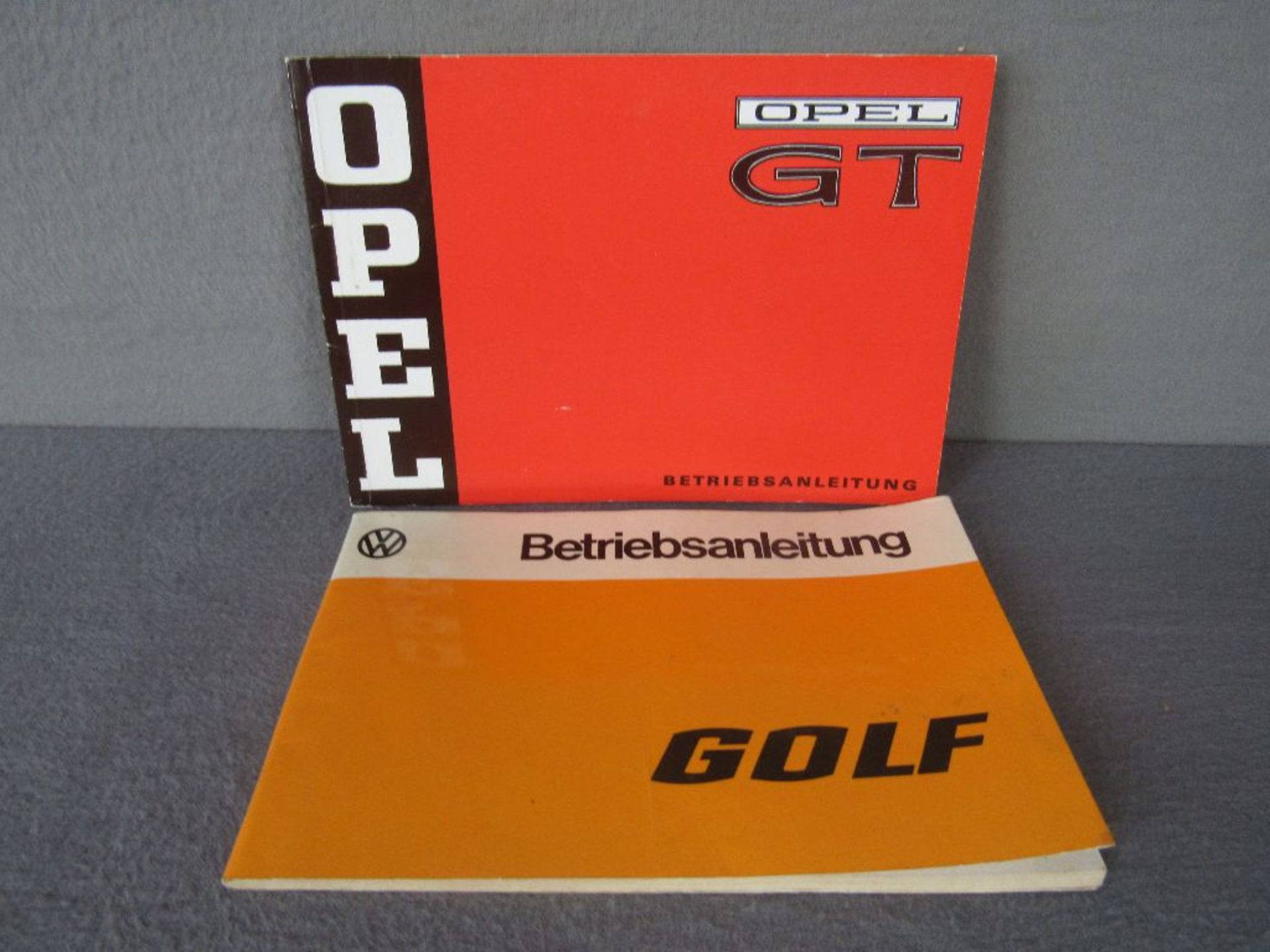 Zwei Bedienungsanleitungen Betriebsanleitungen Opel GT und Golf 1