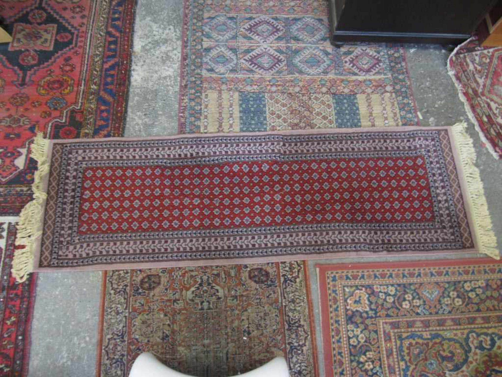 Teppich handgeknüpft Läufer rotgrundig 63x200cm Kashmir reine Schurwolle