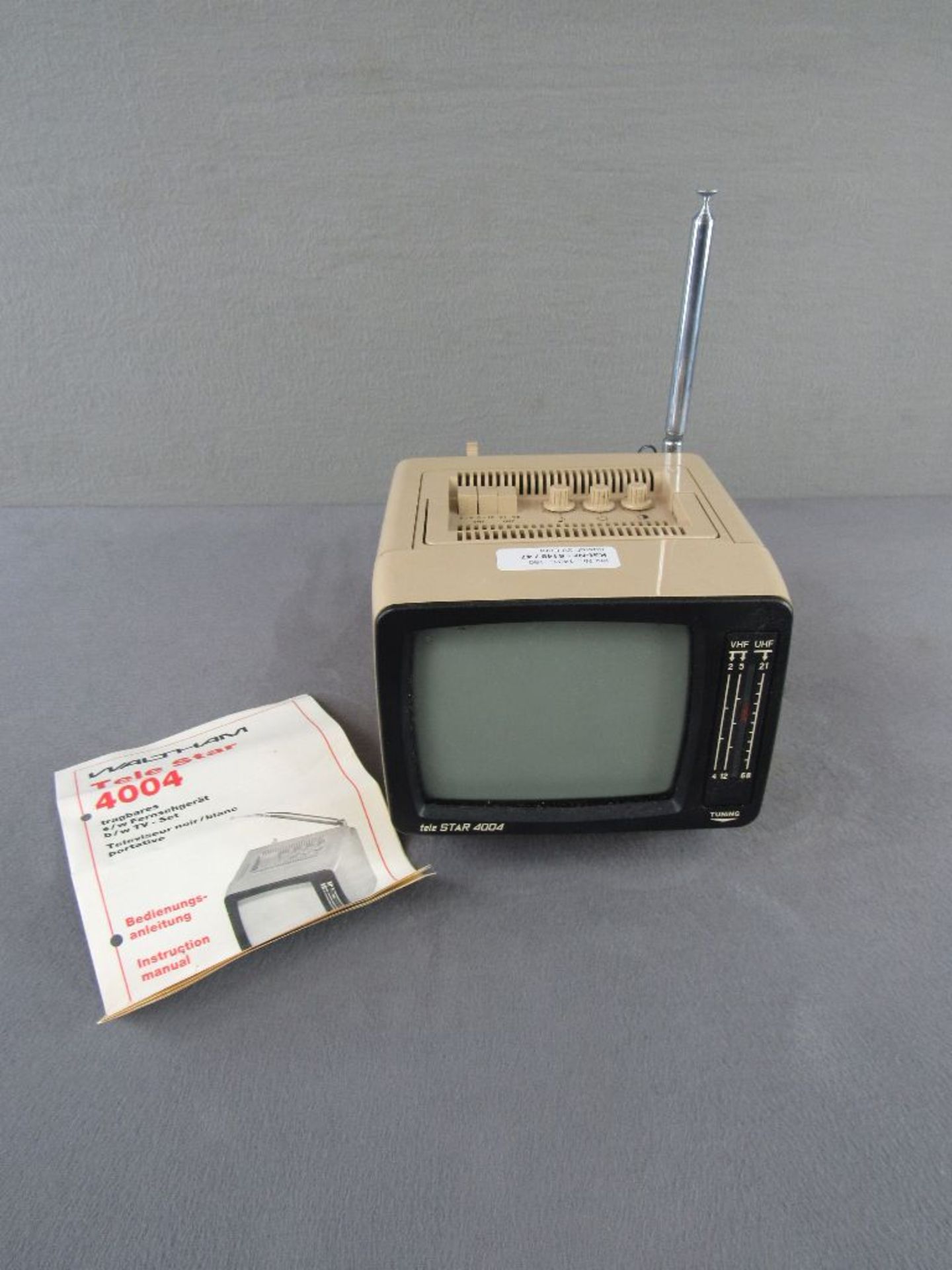 Vintage tragbarer Fernseher 70er Jahre Telestar 4004 mit original Anleitung