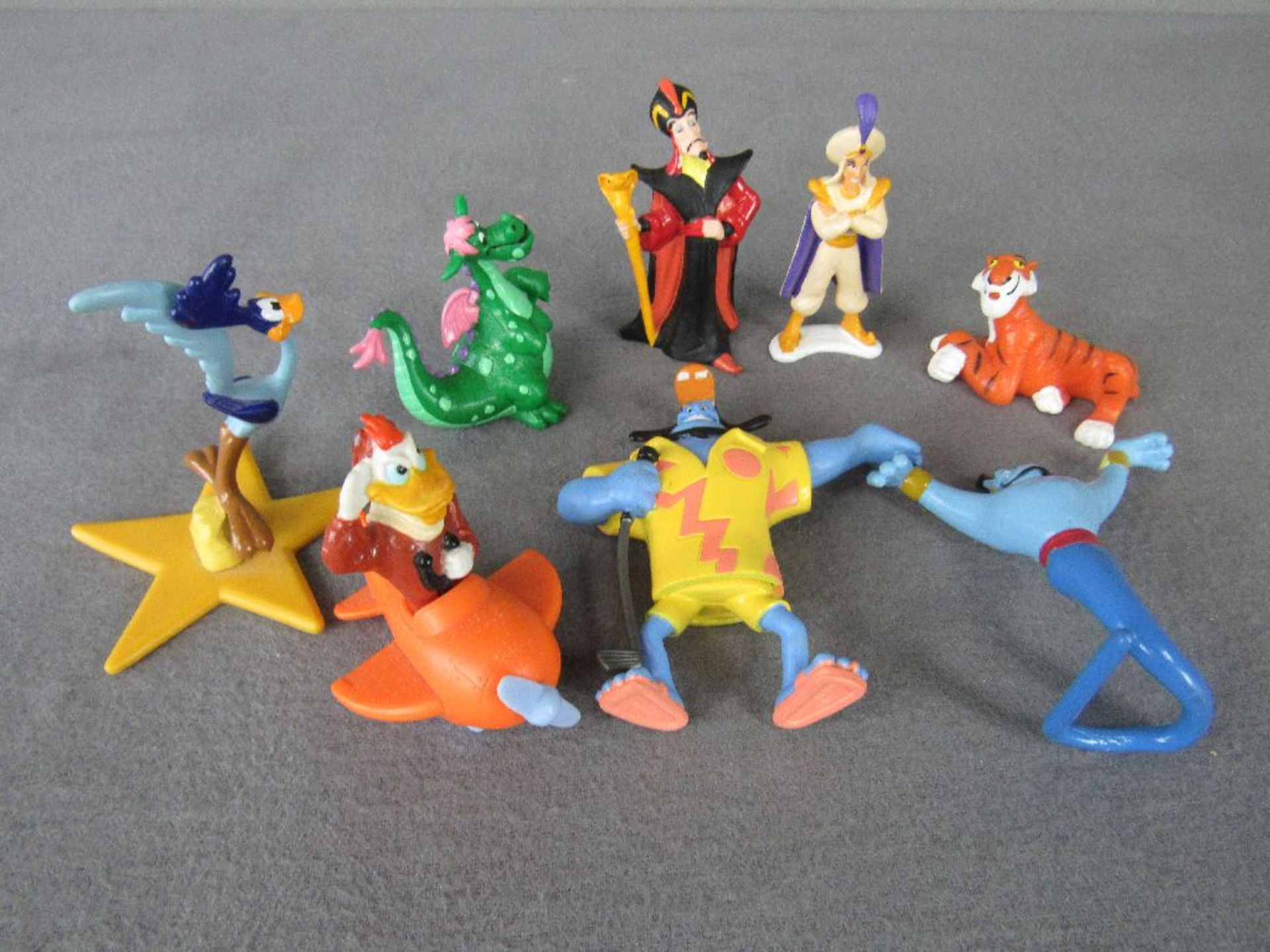 Acht Disneyfiguren