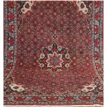 Bidjar, Persien, rotgrundig mit zentralem Medaillon und floralen Motiven, 1x Verfärbung imunteren
