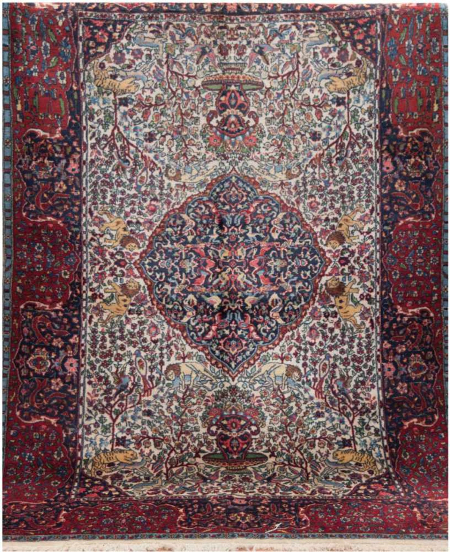 Orientteppich Kirman, mehrfarbig mit zentralem Medaillon, Vasen-, Tier- und Floralmotiven,leicht